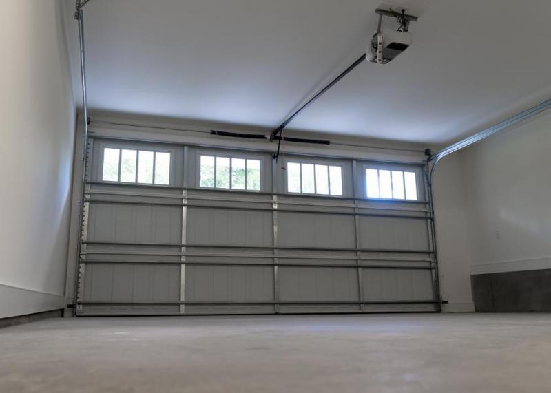 Porte de garage sectionnelle ou basculante, quel impact sur l'espace de votre garage &agrave; Yutz ?